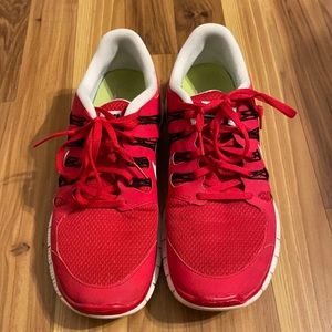 Used Nike free run 5.0 tennis shoes.